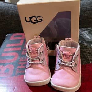 Baby UGG boots; size “XS”: 0-6 months. Pink; gently used.